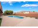 Backyard pool with view of tile roof and mountain view at 120 N Phyllis St, Las Vegas, NV 89110