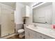 Bathroom featuring a frosted glass shower, vanity, and toilet at 120 N Phyllis St, Las Vegas, NV 89110