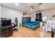 Bedroom featuring a bed, nightstand, dresser, and a crib at 120 N Phyllis St, Las Vegas, NV 89110
