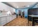 Spacious kitchen with white cabinets and ample counter space at 120 N Phyllis St, Las Vegas, NV 89110