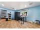 Room featuring tile floors, large window, and a table and chairs at 120 N Phyllis St, Las Vegas, NV 89110