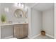 Small bathroom featuring vanity with knee space, toilet and sink at 14 Parco Fiore Ct, Henderson, NV 89011