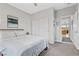 Cozy bedroom featuring a ceiling fan, sliding door closet and decorative art at 14 Parco Fiore Ct, Henderson, NV 89011