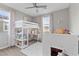 bedroom with lofted bed, shelving, desk, and decorative rug and natural light at 14 Parco Fiore Ct, Henderson, NV 89011