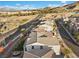 A row of beautiful homes near a street, complete with neatly maintained landscaping at 14 Parco Fiore Ct, Henderson, NV 89011