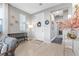 Inviting foyer with a modern bench, elegant decor, and a view into the home at 14 Parco Fiore Ct, Henderson, NV 89011
