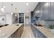 Well-appointed kitchen with granite countertops, stainless appliances, and a spacious island for cooking and entertaining at 14 Parco Fiore Ct, Henderson, NV 89011
