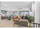 Bright, open-concept living area with mountain views and an adjacent kitchen at 14 Parco Fiore Ct, Henderson, NV 89011