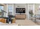Comfortable living area with decorative accents, comfortable seating, and a view of the outdoors at 14 Parco Fiore Ct, Henderson, NV 89011