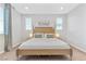 Relaxing bedroom retreat featuring a large bed, natural light, and carpet at 14 Parco Fiore Ct, Henderson, NV 89011