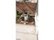 Small backyard space featuring two A/C units on mulch with some decorative rocks at 1423 Orange Jubilee Rd, Henderson, NV 89014