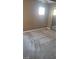 This bedroom features neutral walls, carpet flooring, and sliding closet doors at 1423 Orange Jubilee Rd, Henderson, NV 89014