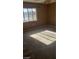 Bright bedroom with large window, carpeted floor and natural light at 1423 Orange Jubilee Rd, Henderson, NV 89014