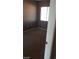 Cozy bedroom with neutral carpet, window, and light-colored walls at 1423 Orange Jubilee Rd, Henderson, NV 89014