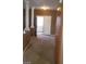 Inviting entryway showcasing decorative columns and convenient cabinet storage at 1423 Orange Jubilee Rd, Henderson, NV 89014