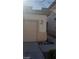 Home featuring a two-car garage, desert-style landscaping and visible address at 1423 Orange Jubilee Rd, Henderson, NV 89014