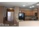 Well-equipped kitchen featuring stainless steel appliances and ample counter space at 1423 Orange Jubilee Rd, Henderson, NV 89014