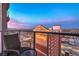Balcony view featuring a sitting area and clear views of the city and stunning pink and blue sky at twilight at 150 Las Vegas Blvd # 1912, Las Vegas, NV 89101