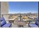 Relax on this condo's balcony, complete with comfortable seating and stunning views of the city skyline at 150 Las Vegas Blvd # 1912, Las Vegas, NV 89101