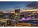 Evening cityscape view of Las Vegas with neon lights illuminating the skyline at twilight at 150 Las Vegas Blvd # 1912, Las Vegas, NV 89101