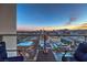 Enjoy the city view and a comfortable place to relax on this high rise balcony with two chairs at 150 Las Vegas Blvd # 1912, Las Vegas, NV 89101