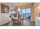 Stylish dining area with city views, hardwood floors, and an open concept layout leading to a living room at 150 Las Vegas Blvd # 1912, Las Vegas, NV 89101