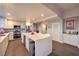 Modern kitchen with stainless steel appliances, kitchen island with a wine cooler, and plenty of cabinet space at 150 Las Vegas Blvd # 1912, Las Vegas, NV 89101