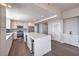 Spacious, well-lit kitchen with a large island, modern appliances, and beautiful hardwood flooring throughout at 150 Las Vegas Blvd # 1912, Las Vegas, NV 89101
