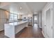 Contemporary kitchen with stainless steel appliances, island, and tile backsplash at 150 Las Vegas Blvd # 1912, Las Vegas, NV 89101