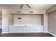 Living area features built-in cabinets and shelving along a wall at 150 Las Vegas Blvd # 1912, Las Vegas, NV 89101