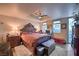 Elegant main bedroom with tray ceiling, plush bedding, and a view; features warm lighting and classic furnishings at 150 Las Vegas Blvd # 1912, Las Vegas, NV 89101
