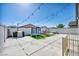 Spacious backyard featuring a playground, trampoline and string lights for outdoor fun at 1714 Ringe Ln, Las Vegas, NV 89156