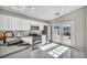 Bright kitchen features quartz countertops, stainless steel appliances, and french doors to backyard at 1714 Ringe Ln, Las Vegas, NV 89156