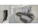 Living room features a large sectional sofa, tv, and great natural light at 1714 Ringe Ln, Las Vegas, NV 89156