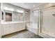 Bathroom featuring a soaking tub, a separate shower and double vanity at 172 Petaluma Valley Dr, Las Vegas, NV 89138