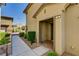Inviting front entrance with a covered entryway and manicured landscaping at 172 Petaluma Valley Dr, Las Vegas, NV 89138
