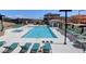 Community pool area with resort-style amenities including lounge chairs and a jacuzzi at 172 Petaluma Valley Dr, Las Vegas, NV 89138