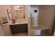 Bathroom with vanity, mirror, and a shower-tub combination at 1830 N Pecos Rd # 155, Las Vegas, NV 89115