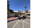 Neighborhood clubhouse with parking and an array of mailboxes for residents at 1830 N Pecos Rd # 155, Las Vegas, NV 89115
