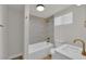 Bathroom featuring gold hardware, and gray tiled walls at 2112 Santa Ynez Dr, Las Vegas, NV 89104