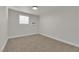Bedroom featuring a neutral color palette, carpeted flooring, and a window at 2112 Santa Ynez Dr, Las Vegas, NV 89104