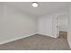 Bedroom with neutral walls and carpet, closet with sliding doors at 2112 Santa Ynez Dr, Las Vegas, NV 89104