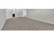 Spacious bedroom with neutral carpet and white walls, featuring doorways to other rooms at 2112 Santa Ynez Dr, Las Vegas, NV 89104