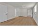 Bright bedroom with new flooring and modern ceiling fan with doorways to other rooms at 2112 Santa Ynez Dr, Las Vegas, NV 89104