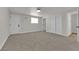 Bedroom with neutral carpet, double closet and two doors at 2112 Santa Ynez Dr, Las Vegas, NV 89104