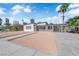 Attractive single-story home boasting desert landscaping, carport, and a glimpse of the iconic Stratosphere Tower at 2112 Santa Ynez Dr, Las Vegas, NV 89104