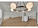 Bright living area featuring views to a modern kitchen with stainless steel appliances and ample countertop space at 2112 Santa Ynez Dr, Las Vegas, NV 89104