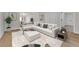 Bright living room featuring a comfortable white sectional sofa, neutral tones, and modern decor at 2112 Santa Ynez Dr, Las Vegas, NV 89104