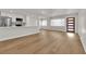 Inviting open-concept living room seamlessly flowing into a modern kitchen with stainless steel appliances at 2112 Santa Ynez Dr, Las Vegas, NV 89104