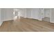 Spacious living room features light, wood-look floors, modern door and window details, and a bright, neutral color palette at 2112 Santa Ynez Dr, Las Vegas, NV 89104